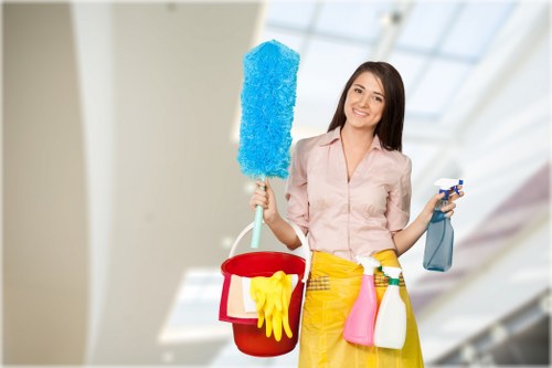 Technician removing stains during carpet cleaning